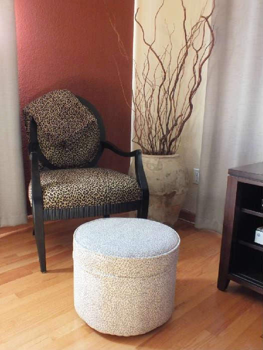 unique armchair, ottoman, large vase