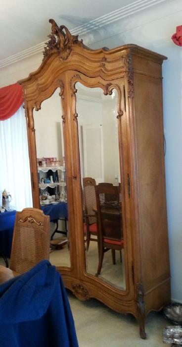 Louis XV style mirror door armoire with rocaille crest