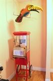 Popcorn maker and large wood toucan
