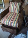 Wicker chair with pull-out ottoman