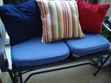 2 seater glider with cushions