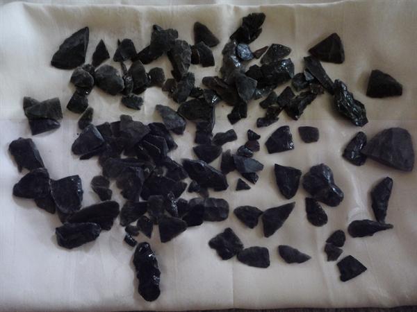 Obsidian arrowheads -- part of whole collection