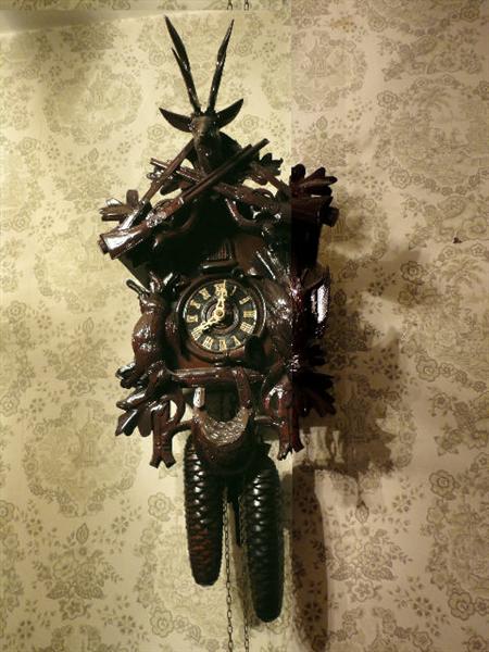 Cuckoo clock, a number of other clocks of various ages and quality
