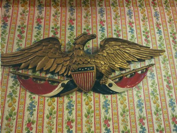 Cast metal hand painted eagle, gift from Walter Knott, many other eagle figures of porcelain, metal and wood