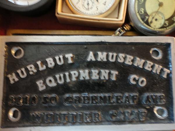 A number of Hurlbut Amusement Co. plaques