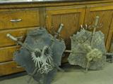 Hand made metal shields with swords