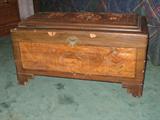Circa 1940 carved top camphor small trunk.