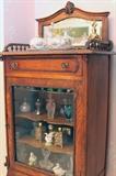 Early American Victorian Music Stand filled with a High End Perfume Bottles 