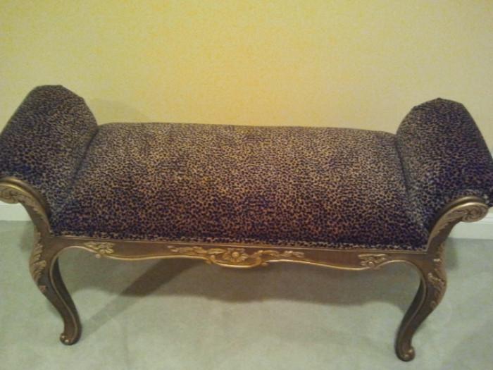 Gold bench with leopard apolstery