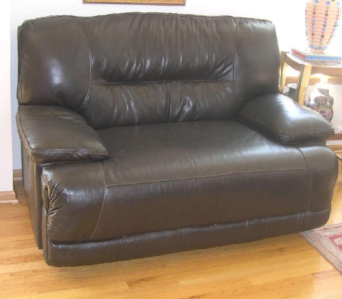 black leather love seat ( one of two)