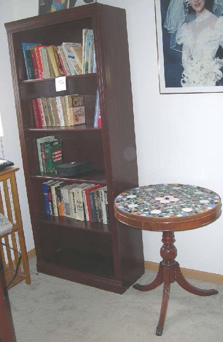 Tall bookcase, round mosaic table