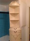 very pretty French style antico finish corner etagere with cabinet.  Leaf scroll motif carvings and cabriole feet.