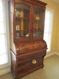 Eastlake secretary with a roll top, burl veneer, scallop and peg joinery. 86" tall