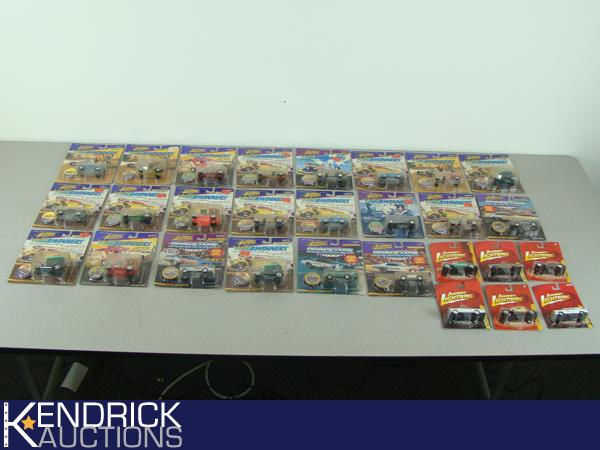 Lot of 28 - 1/64 Scale Carded Johnny Lightning Die Cast Cars
