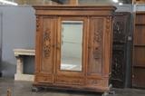 Carved armoire
