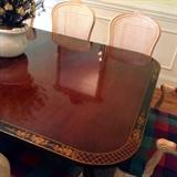 Decorative tole-painted edge of the table