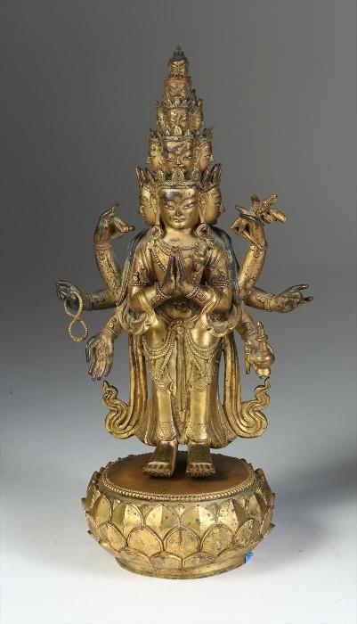 Sino Tibetan Gilt Bronze Figure of Avalokiteshvara with Eight Arms, 18th Century