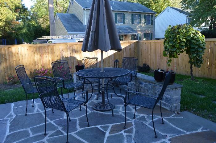 Patio table, chairs and umbrella.  In perfect shape.  Umbrella has remote control and LED lights.