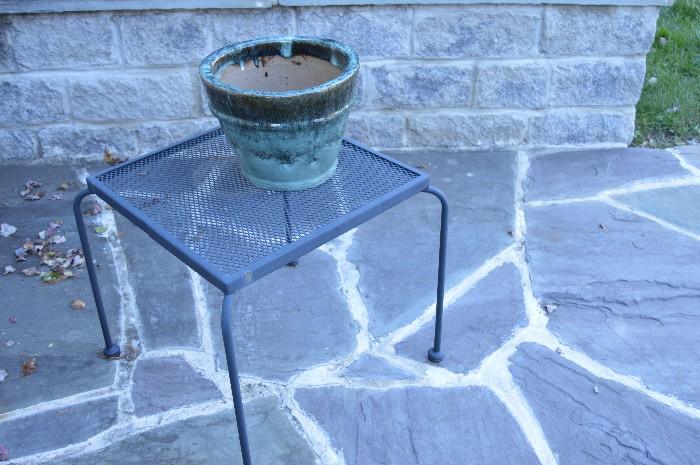 Outdoor end table.  Ceramic flower pot