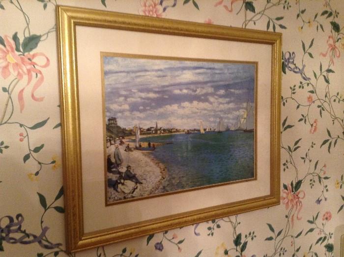 Monet print in frame under glass