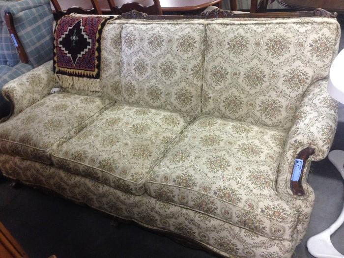Beige and Brown Decorative Couch with Wooden Arm Handles