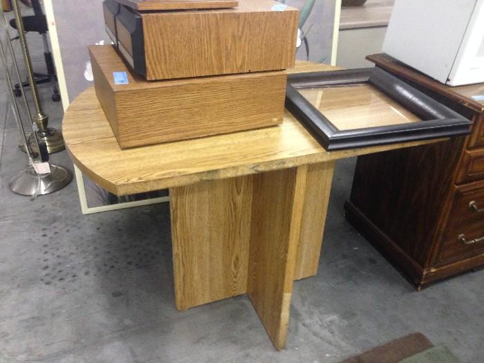 Wooden Table, VHS Storage Containers and a Black Frame
