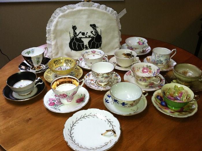 bone china tea cups and saucers, tea pots and tea cozy