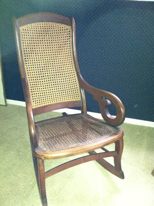 antique Lincoln rocker with caning
