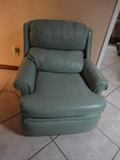 Barley used light green recliner 