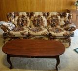 VINTAGE FLORAL SOFA - UPHOLSTRY IS IN EXCELLENT CONDITION! WE HAVE THE MATCHING LOVESEAT. ALSO PICTURED "QUEEN ANNE COFFEE TABLE"