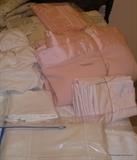 Lots of very fine linen, also wool blankets, king sheets, full sheets, pillows, quilts and more