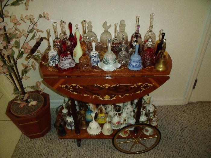 Fine bell collection and fancy tea cart.  Cart is beautiful with inlay wood