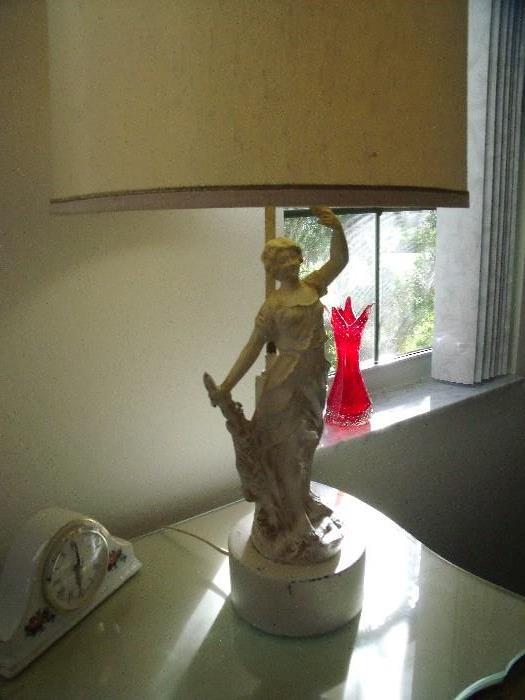Close up of figural lamp (one of a pair)