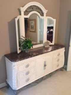 Triple mirror dresser with rich, mocha marble top