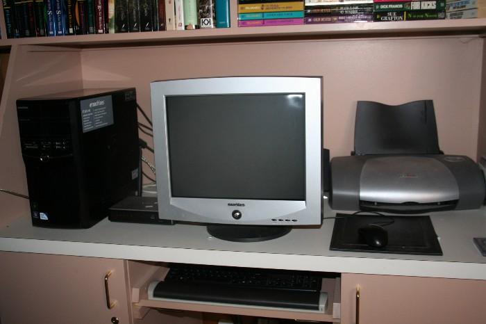 Emachine ET1831-01, comes with the flat screen monitor, printer, speakers,  mouse, & Keyboard.