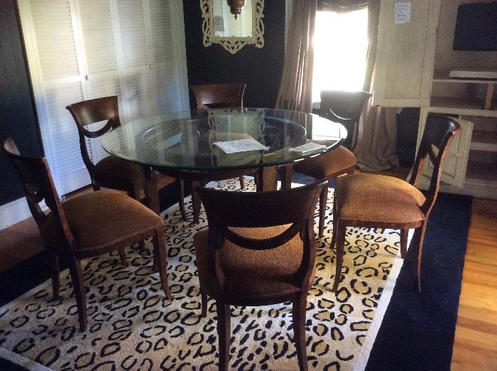Gorgeous table with 6 chairs, print rug 