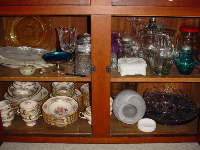 Lower shelves of china cabinet include Castleton Rose dish set, vases, platters, etc.