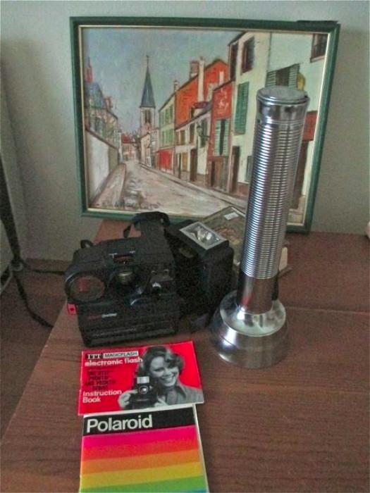 Camera and vintage flashlight