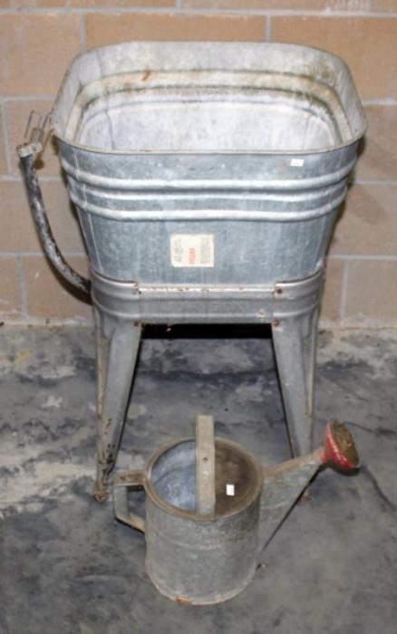  	Square Galvanized Washtub on Stand with Watering Can. Approx 20.5" W x 20.5" D x 32" H
