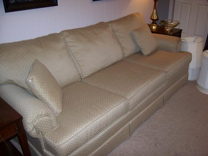 Very clean and classic sofa - perfect for the family room or that first apartment - long enough to stretch out on.....