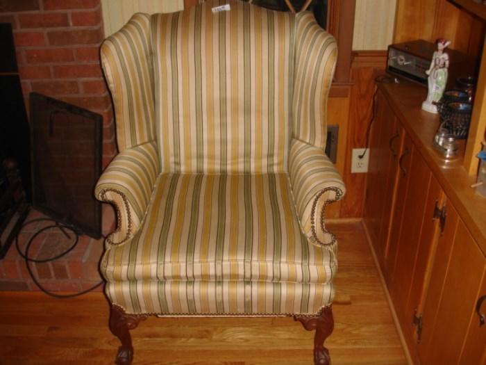 Carved legs on wingback chair