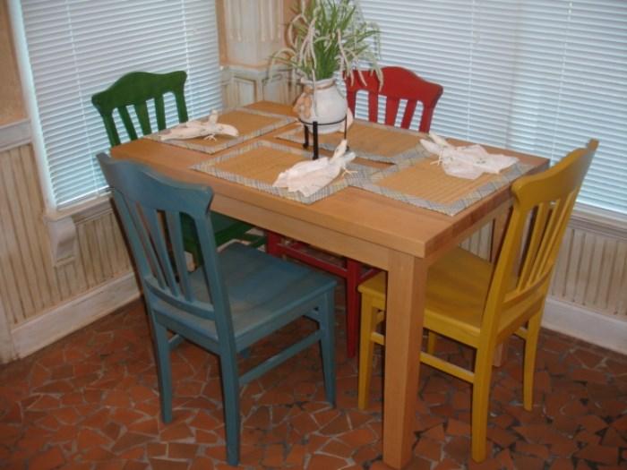 Butcher block table with four solid chairs, cost over $1000, but priced to sell.  Like new condition