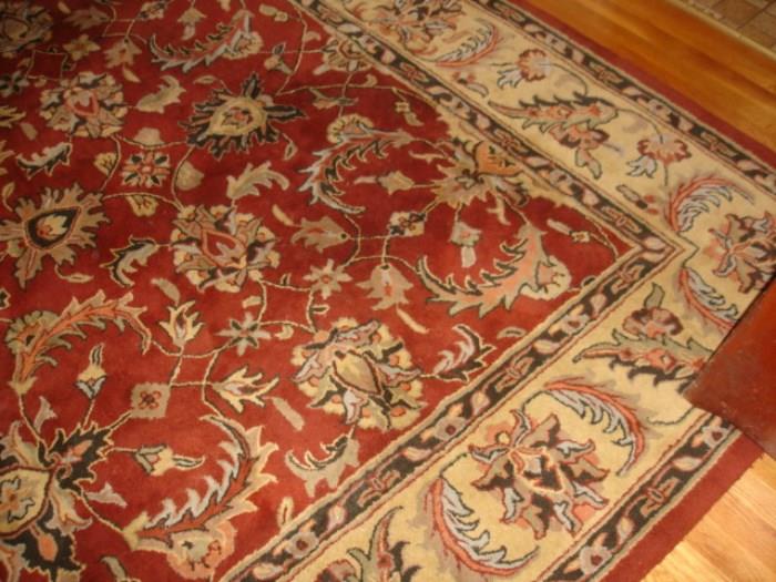 Several quality room size rugs plus a long wool runner.