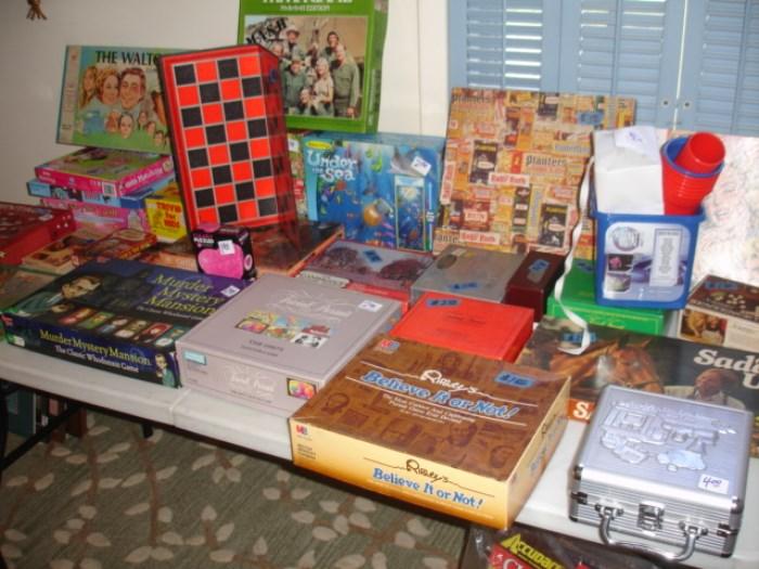 Many Vintage and newer games including Bionic Women, Walton's, MASH, Marilyn Monroe Puzzle, Dallas Game, Dominoes, and Where's the Beef.