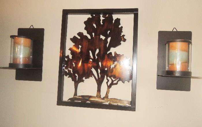 newer, contemporary metal wall decor and candle sconces