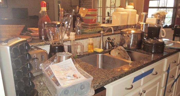Full kitchen, dishes, pots & pans, small kitchen appliances.  Many new items