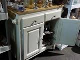 Very nice kitchen cart with wood top and towel bars on each side. It is on rollers.