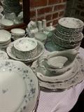 Gorgeous Haviland China trimmed in silver. Complete with serving pieces.