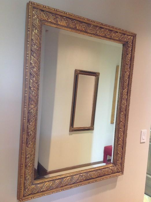 Carved gilt wood mirror