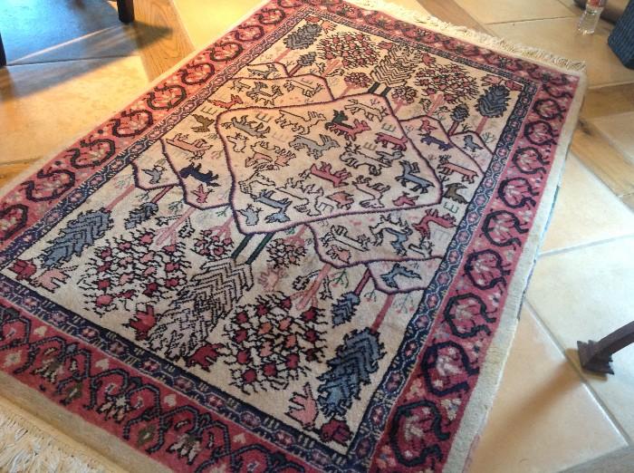 Hand-woven rug, 66 x 39, sold by Azadi